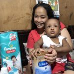 Jan De Los Reyes with the needed essentials for her baby